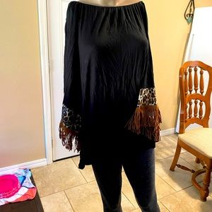 Like new black off shoulders top size sm/med.